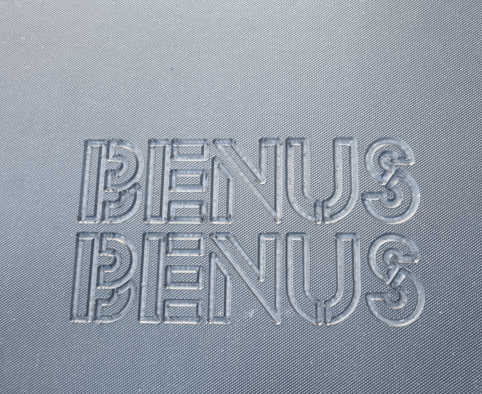 Engraving company name on a ground protection mat